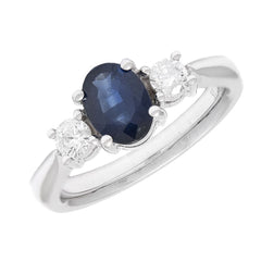 Anillo zafiro 1 cts y 2 btes tot 0,26 cts a los lados
