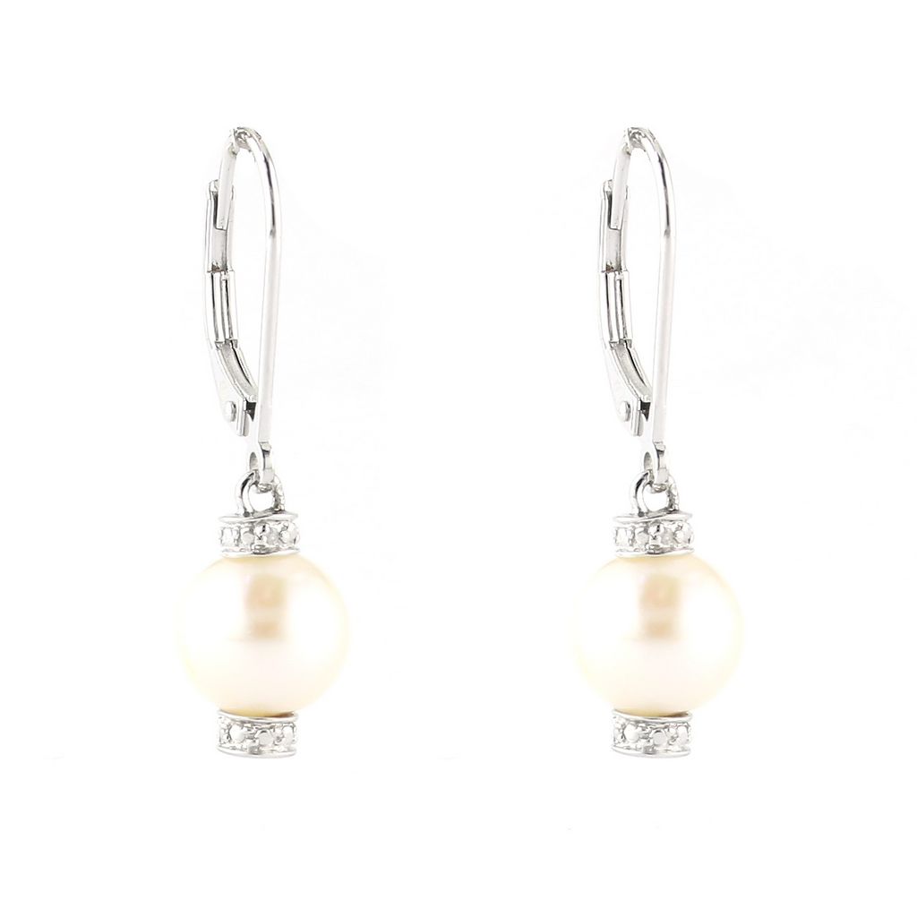 Aros plata con perla colgando y brillantes en el tope
