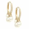 Argollas brillantes 3 perlas colgando.
