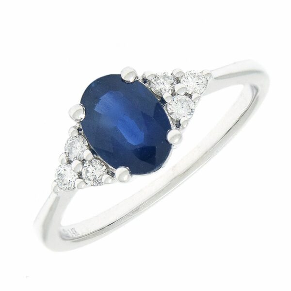 Anillo zafiro central 1,12 cts con 3 btes por lado, tot 0,17 cts