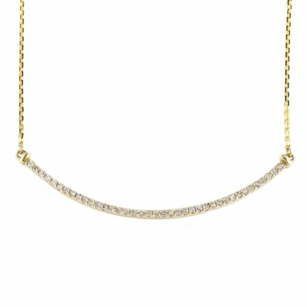 Collar oro barrita de billantes al centro.